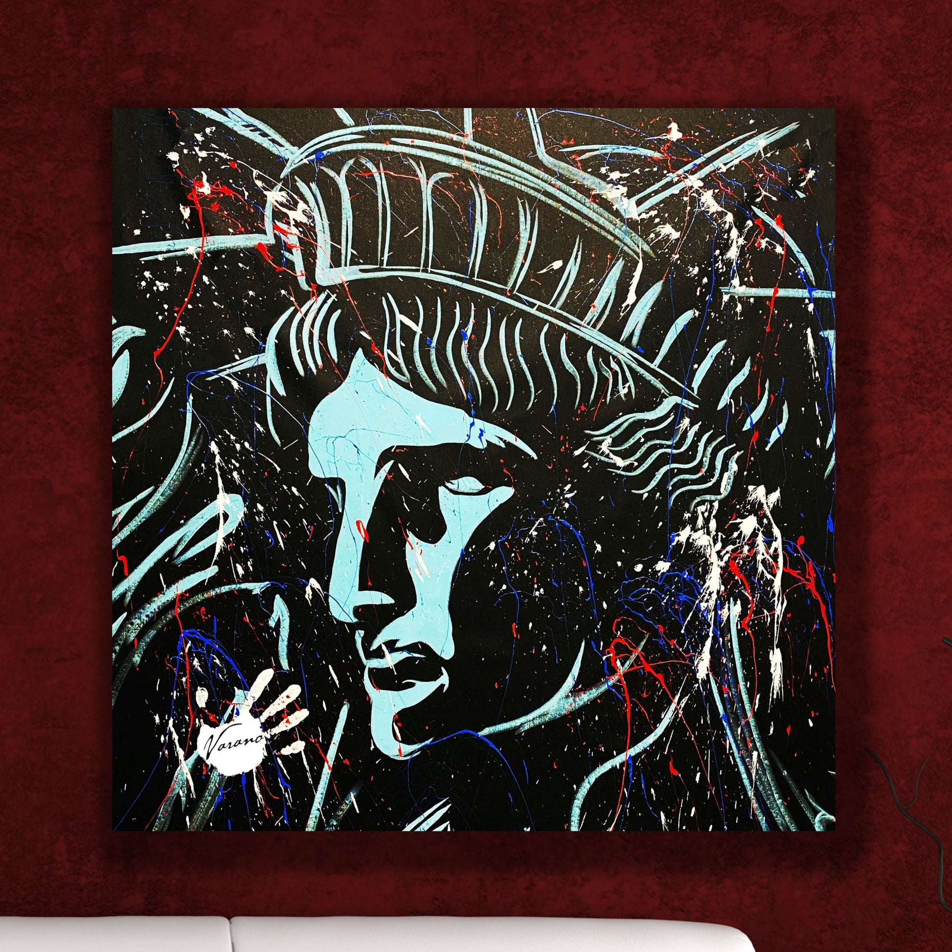 Statue of Liberty modern wall art by patriotic artist Tom Varano featuring bold red, white, and blue splatter paint on black canvas background.